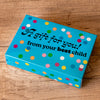 Bad Grandma's "A Gift For You From Your Best Child" gift box. The box is blue with polka dots and fits up to 2 towels