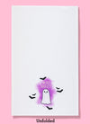 Unfolded view of the Boo Sheet dishtowel featuring illustrations of a cute ghost, flying bats, and a purple background.