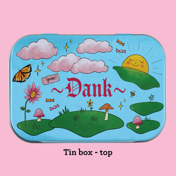 The top of the Dank tin, showing design elements on a blue background with red text that reads "Dank"