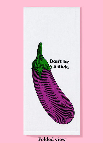 Folded dishtowel with the text DONT BE A DICK and a picture of a vibrant purple eggplant.