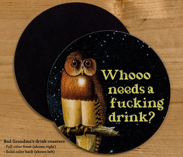The front and back of the round drink coaster. The front features the text Whooo needs a fucking drink' along with a vintage illustration of an owl in the night sky. The back of the coaster is solid black.