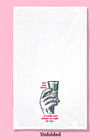 Unfolded dishtowel with the satirical phrase Ask your doctor is vodka and valium are right for you and an illustration of a hand holding a shot glass with green liquid.