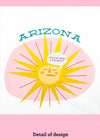 Close-up of a dishtowel with the phrase Arizona, Fuck Me It's Hot and an illustration of a sweating sun.