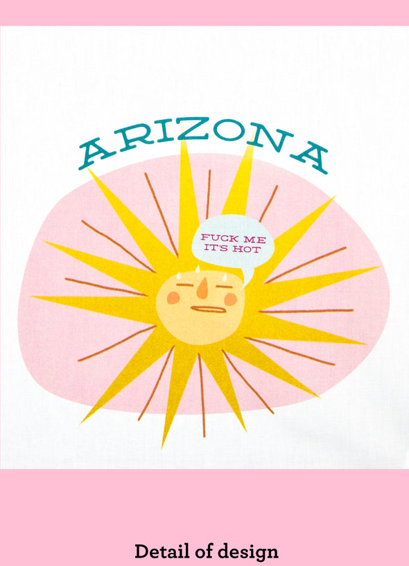 Close-up of a dishtowel with the phrase Arizona, Fuck Me It's Hot and an illustration of a sweating sun.