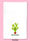 Unfolded dishtowel with an illustration of a smiling cactus and the phrase Don't Be a Prick.