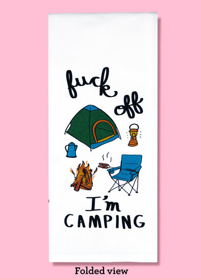 Folded dishtowel with an illustration of camping gear with the phrase Fuck Off I'm Camping..