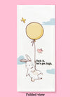Folded dishtowel with an illustration animals floating with helium balloons and the phrase Fuck It Lets Get High.