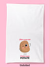 Unfolded dishtowel with an illustration of a smiling and waving russet potato and the phrase Haters Gonna Hate Potatoes Gonna Potate.