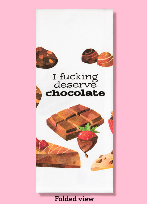 Folded dishtowel with illustrations of chocolate treats and the words I Fucking Deserve Chocolate.