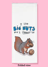 Folded dishtowel with an illustration of a squirrel eating a walnut and the phrase I Like Big Nuts and I Cannot Lie.