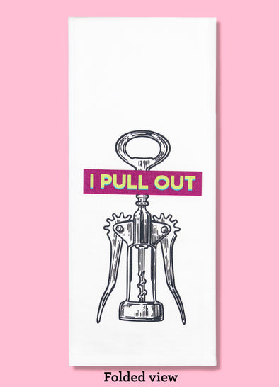 Folded dishtowel with a black-and-white illustration of a corkscrew with the phrase I Pull Out.