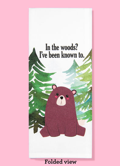 Folded dishtowel with an illustration of a cute bear with the phrase In the Woods? I've Been Known To.