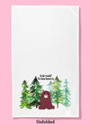 Unfolded dishtowel with an illustration of a cute bear with the phrase In the Woods? I've Been Known To.
