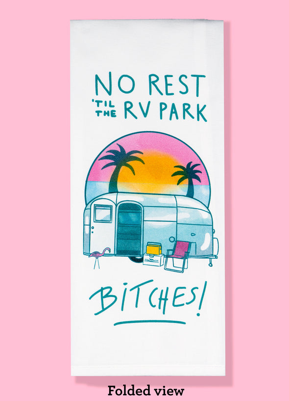 Folded dishtowel with an illustration of an R V trailer and the phrase no rest 'til the RV park bitches!