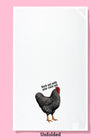 Unfolded dishtowel with the phrase rock out with your cock out. The illustration is of a rooster with black and white feathers
