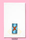 Unfolded dishtowel of an illustration of a faux tarot card featuring two cooked bacon strips in an X formation surrounded by 4 clouds with the phrase The Bacon