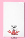Unfolded dishtowel with the phrase that shit's cray. The illustration is of a cartoon crayfish smiling