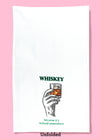 Unfolded dishtowel with the phrase whiskey because it's Ireland somewhere. The illustration features a hand holding up a half full glass of whiskey and ice